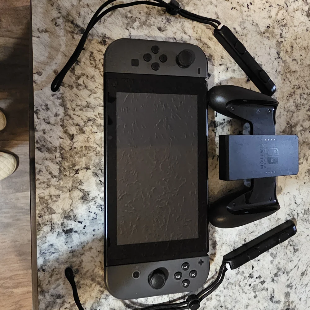 Nintendo Switch with Gray Joy-Con Controllers, Joy Con Grip, And 2 Games. No Doc